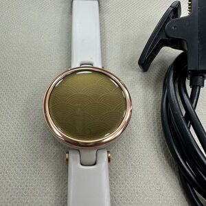 Garmin Gold and White Smartwatch with Sleek Design